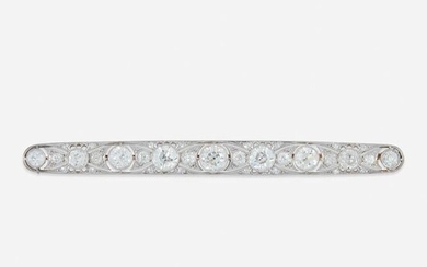 An Art Deco diamond and platinum bar brooch