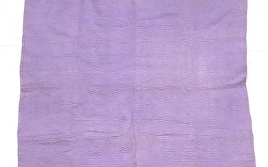 An Early 20th Century Wholecloth Quilt, with mauve on one...