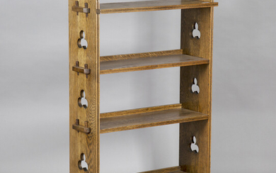An Edwardian Arts and Crafts oak four-tier 'Sedley' bookcase by Liberty & Co, the pegg