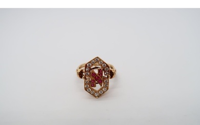 An approx 18ct (tested) yellow gold diamond and ruby ring - ...