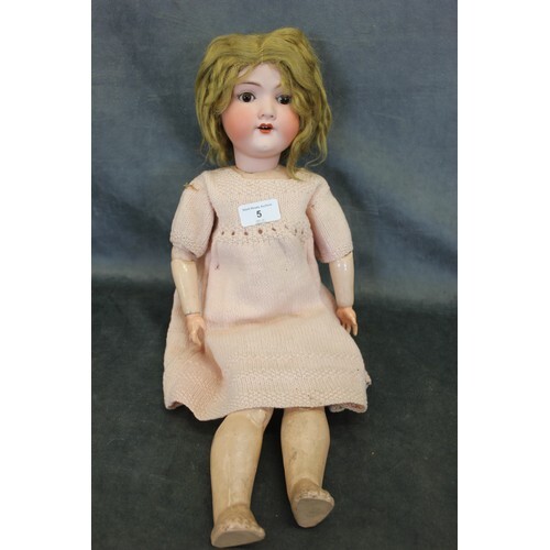 An early 20th century German bisque head doll, mould no.390,...