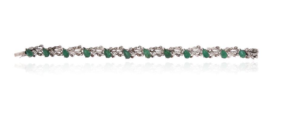 An emerald and diamond-set white gold bracelet