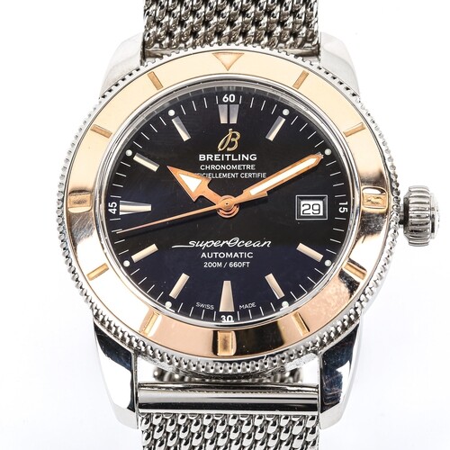 *WITHDRAWN* BREITLING - an 18ct rose gold and stainless stee...