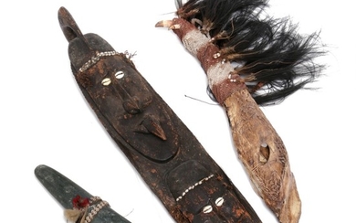 Bone club wrapped with woven rope and casuar feathers, large stone axe and wooden mask. New Guinea style. H. 43–80 cm. (3)
