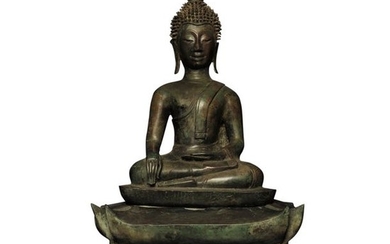 Buddha seated on his throne, in a witness...