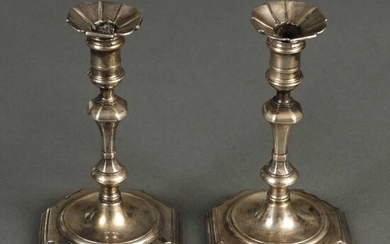 Candlesticks. A pair of George II silver candlesticks
