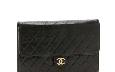 Chanel: A “Mademoiselle Flap bag” made of black quilted calf leather, gold toned hardware, chain strap and magnetic closure on the front.