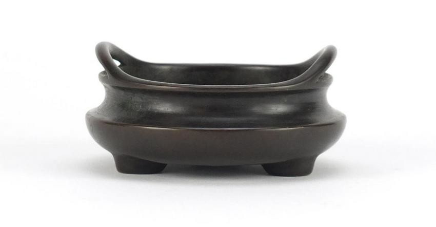 Chinese bronze tripod censer with twin handles