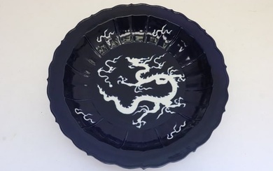 Chinese white on blue porcelain charger
