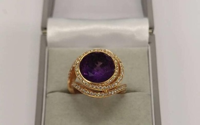 DIAMOND AND AMETHYST GOLD RING, THE CIRCULAR AMETHYST IN A S...