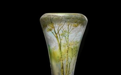 Daum Nancy: A etched and enameled vase of clear, green and blue glass. H. 31 cm.