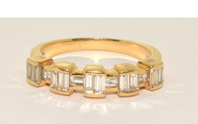 Diamond Baguettes set in 18ct gold 4.8g ring size P