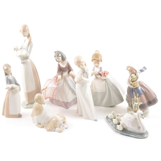 Eight Spanish porcelain figures, including Lladro and Nao