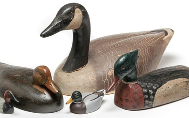 FIVE AMERICAN CARVED AND PAINTED DECOYS.