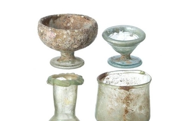 Four Roman glass lacrimarium vials