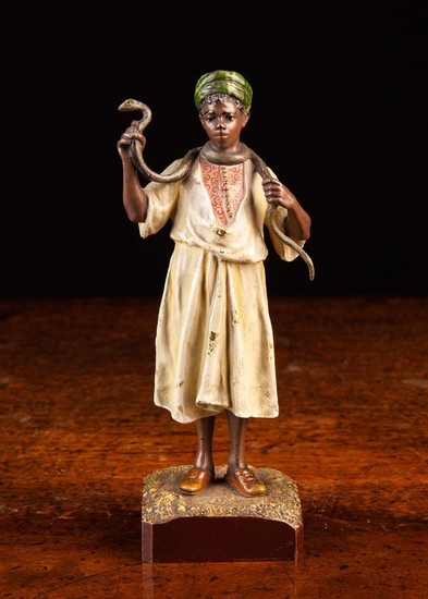 Franz Bergman. An Austrian Cold Painted Orientalist Bronze Figure of a Snake Charmer. The back of hi