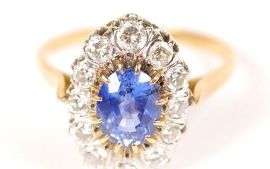 Gold daisy ring (750) probably Ceylon sapphire center (about 1...