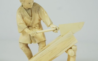 Japanese Ivory Okimono, Meiji Period, Modelled as a Carpenter, Red seal mark to the underside