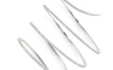 MESSIKA, A DIAMOND SKINNY SNAKE BRACELET in 18ct white gold, designed as a coiled snake, the head