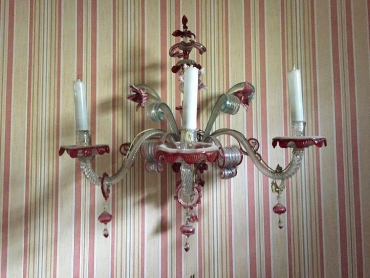 MURANO. Chandelier in rough glass transformed into a wall lamp with three arms of light. Height. 55, Width. 62 (approx.).