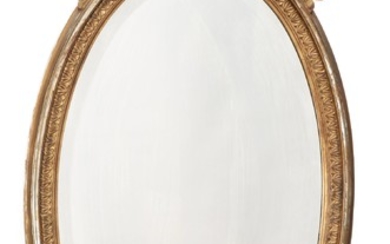 Miroir en bois et stuc doré à décor au sommet d'un ruban