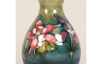Moorcroft pottery vase of baluster form, green/blue ground i...