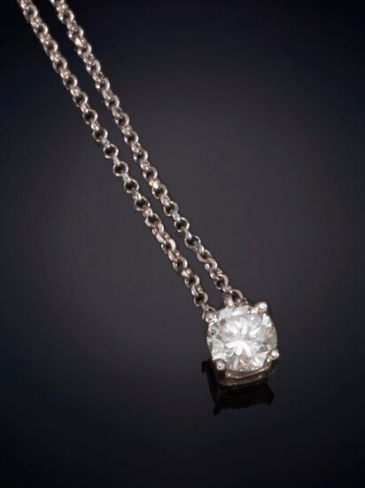 NECKLACE WITH SHINY SOLITAIRE TYPE PENDANT. Frame in 18K white gold. Output: 595.00 Euros. (99.000 Ptas.)