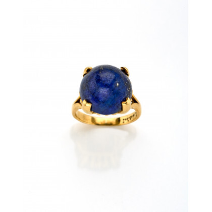 ORLANDINI Yellow gold ring with round cabochon lapis lazuli of mm 14.84x10.17 circa, g 11.13 circa size 15.5/55.5. Signed Orlandini....