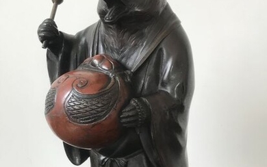 Okimono (1) - Bronze - hight quality tanuki disguised as buddhist priest or pilgrim - Japan - Meiji period (1868-1912)