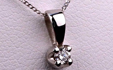 PENDANT of 9mm and CHAIN in 18 kt white gold of 40cm and 0.06 ct brilliant cut natural diamond. Weight: 2 g. Luxurious case.