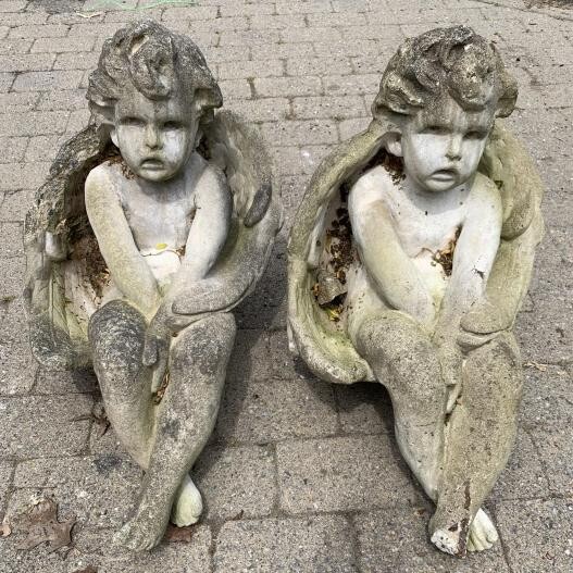 Pair Cast Stone Figural Seated Putti Angel Statues
