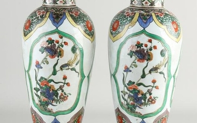 Pair of 18th century Chinese lidded vases, H 30.5 cm.