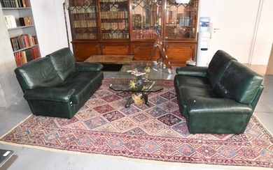 Pair of 2-seater sofas in green leather