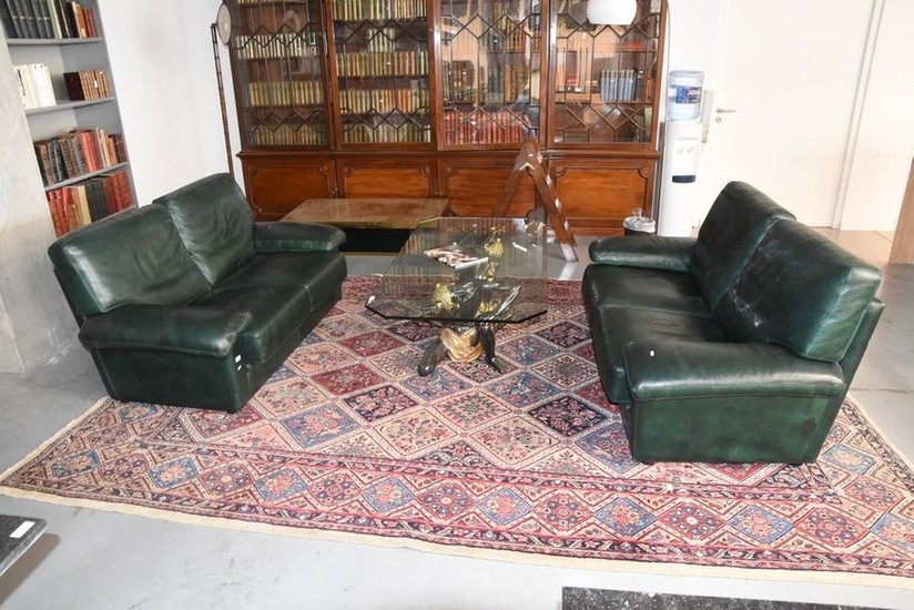 Pair of 2-seater sofas in green leather