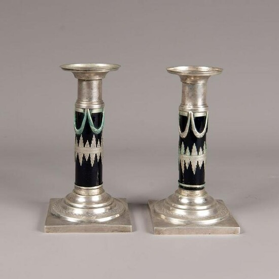 Pair of classicist silver candle sticks