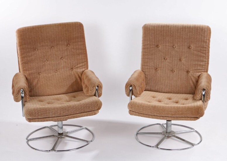 Pair of mid 20th century easy chairs, with buttoned backs, seats and arms, raised on tubular