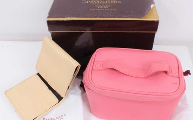 Penhaligon's pink leather travel vanity case and cream leather travel jewellery wallet, both in dust bags, in one box