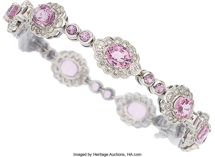 Pink Sapphire, Diamond, White Gold Bracelet The bracelet features...