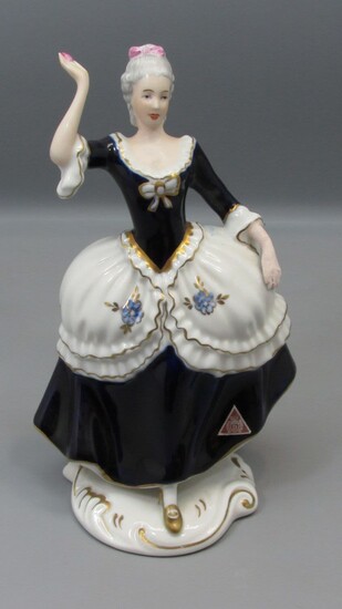 Porcelain Figurine of a Lady in a Decorative Dress Made by Royal Dux