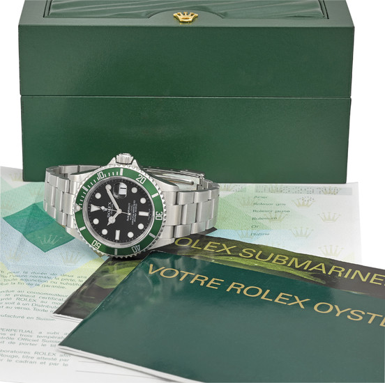 ROLEX. A RARE STAINLESS STEEL AUTOMATIC WRISTWATCH WITH SWEEP CENTRE SECONDS, DATE, BRACELET, ORIGINAL GUARANTEE AND BOX, SIGNED ROLEX, OYSTER PERPETUAL DATE, SUBMARINER, 1000FT = 300M, REF. 16610LV, CASE NO. D082973, CIRCA 2005