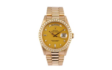 ROLEX. A VERY RARE DAY-DATE SIGMA DIAL. PRESIDENT. 18K YELLOW GOLD AND DIAMOND SET BEZEL AND DIAL.