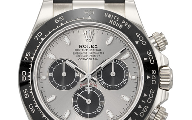 ROLEX. AN ATTRACTIVE AND SPORTY 18K WHITE GOLD AUTOMATIC CHRONOGRAPH...