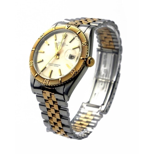 ROLEX, TURN-O-GRAPH, A STAINLESS STEEL AND 18CT GOLD GENT’S ...