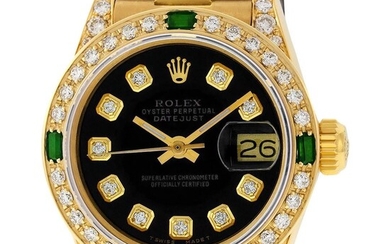 Rolex Ladies 18K Yellow gold with 36 diamonds and 4 emeralds
