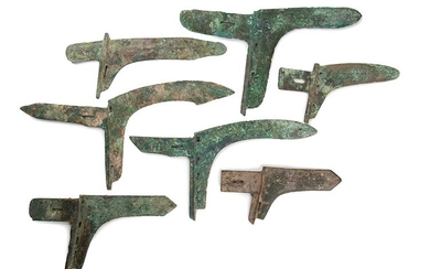 SEVEN BRONZE DAGGER-AXE BLADES, GE China, late Shang – early...