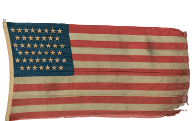 SPANISH-AMERICAN WAR: THE FIRST AMERICAN FLAG TO BE RAISED IN THE PHILIPPINES.