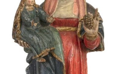 Sainte Anne en bois sculpté et polychromé Travail du XVIIe siècle Hauteur : 57 cm...