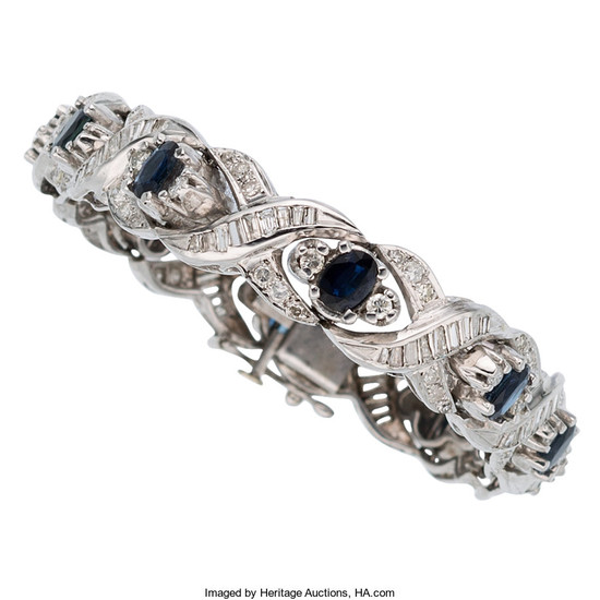 Sapphire, Diamond, White Bracelet The bracelet features oval-shaped sapphires...