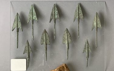 Set of nine bronze arrowheads. Width 6 to...