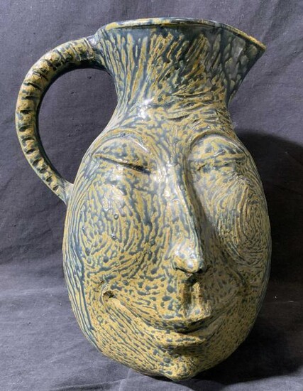 Signed Ceramic Pitcher With Face